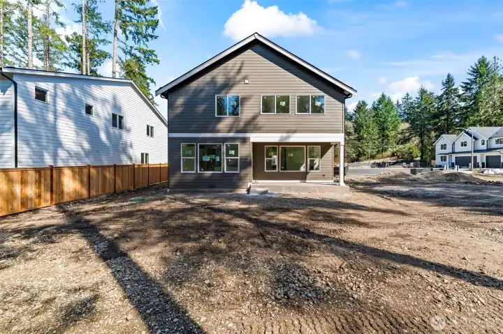 Rear yard will be landscaped and fenced.