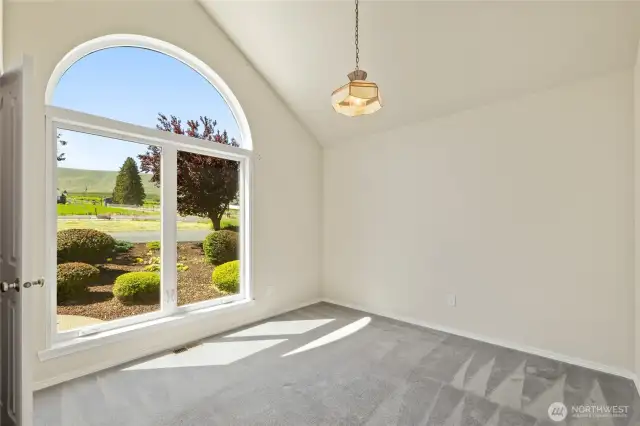 Spare bedroom with beautiful large window