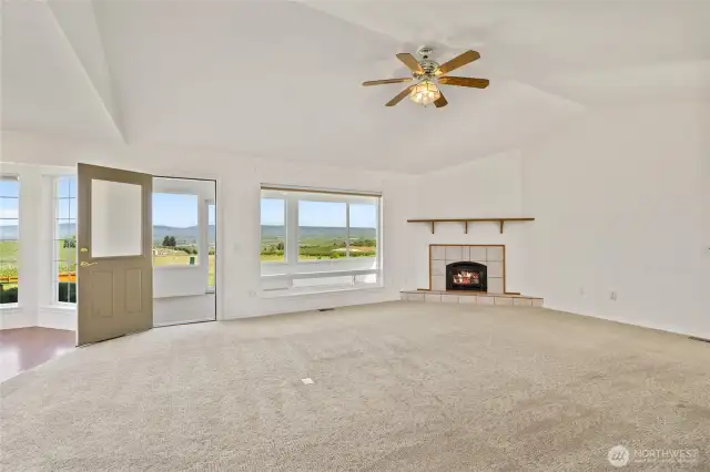 Off the great room is an enclosed porch with windows all around!