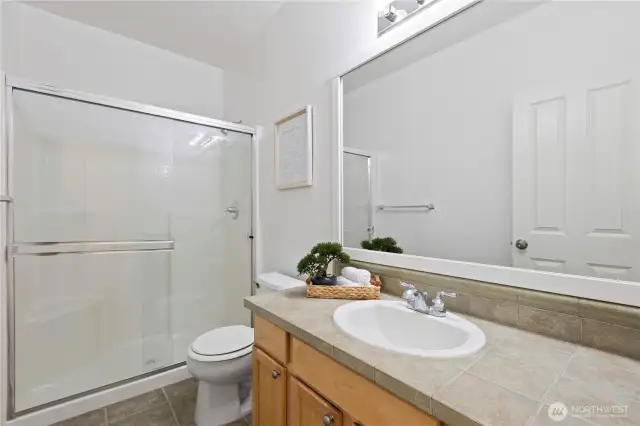 Upstairs full bath with shower tub combo