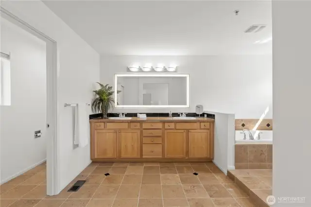 5 piece primary bath with double vanity and soaker tub