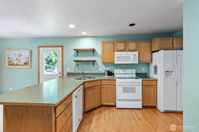 Spacious and open kitchen overlooks a large morning room
