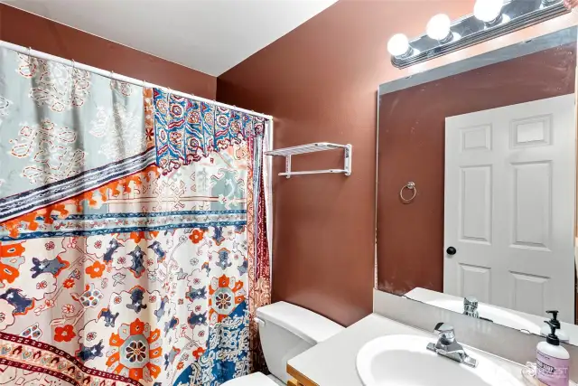 Full bath right outside the second main floor bedroom.  So great for guests!