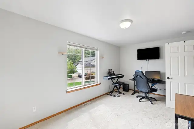 The entire upstairs is another large primary suite!  Great for generational living
