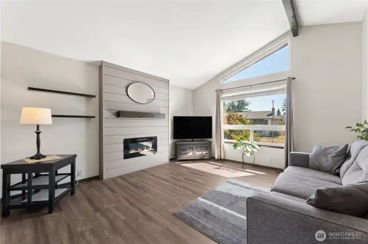 Bright, spacious living area with vaulted ceilings