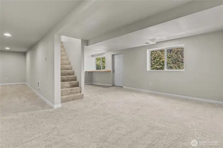 The finished, walkout basement is versatile and spacious.