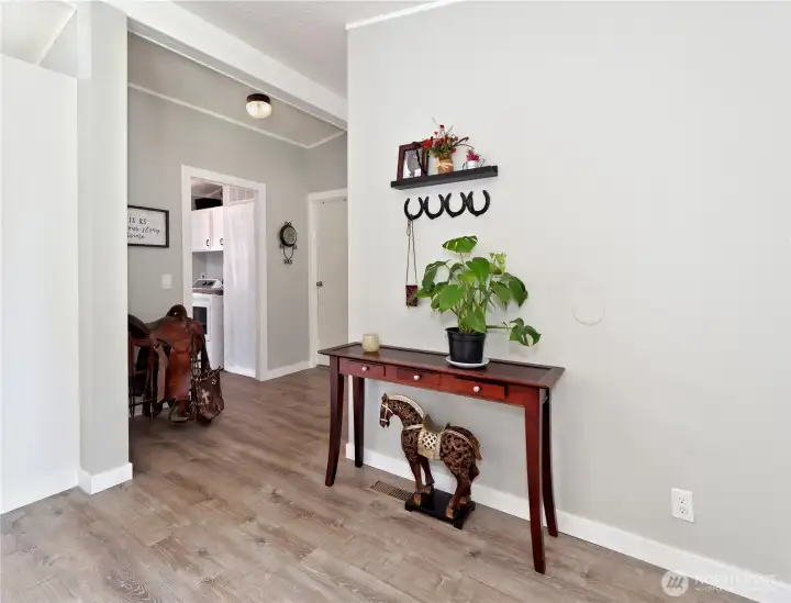 Entryway to 2 guest bedrooms, bath and laundry