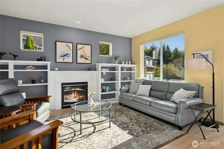 Sunny SW window overlooks backyard. Note the custom blinds throughout the home offer privacy and light control