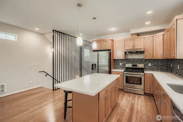 Kitchen area looking at staircase from main floor