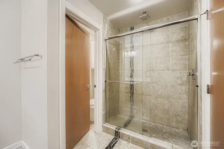 Primary bathroom w/ tile shower