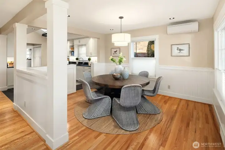 Dining area with beautiful millwork and hardwood floors in excellent condition.