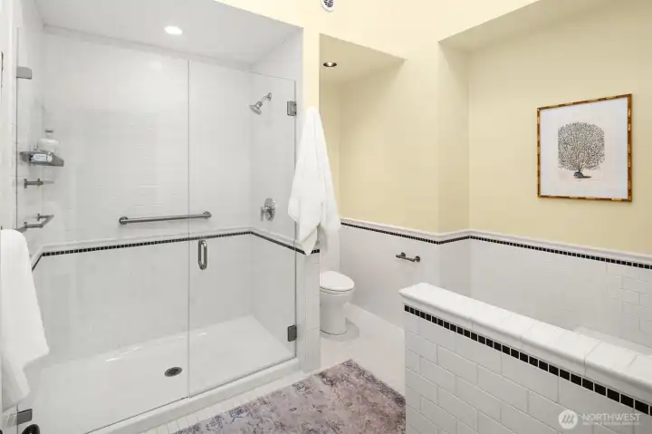 Large Ensuite Bath with tub on right.