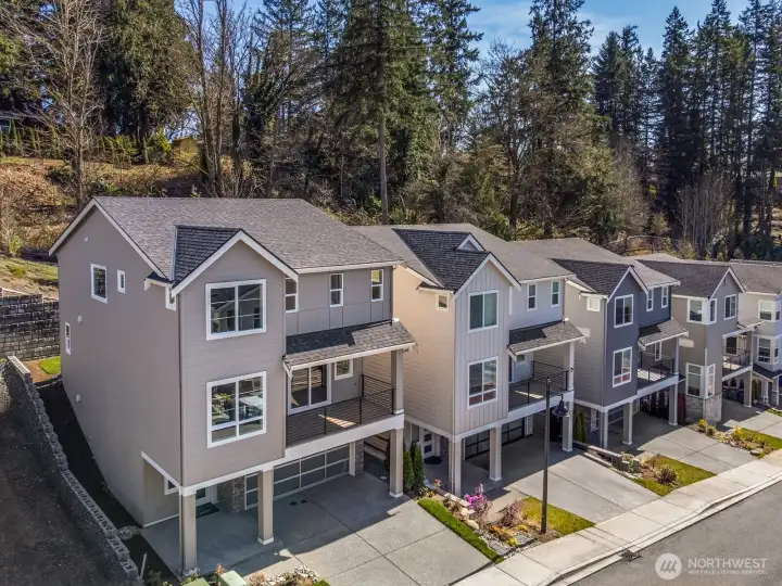 West facing with an abundance of windows for maximum natural light.  Backs up to a green space for privacy.