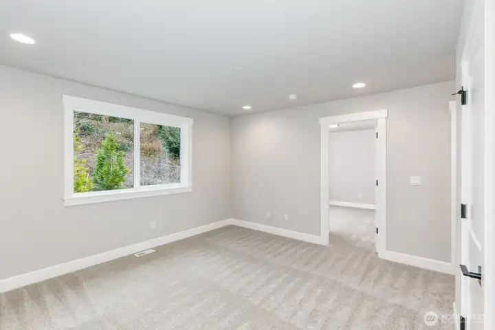 The upper floor loft offers relaxing views of nature and a perfect extra space for multiple uses.