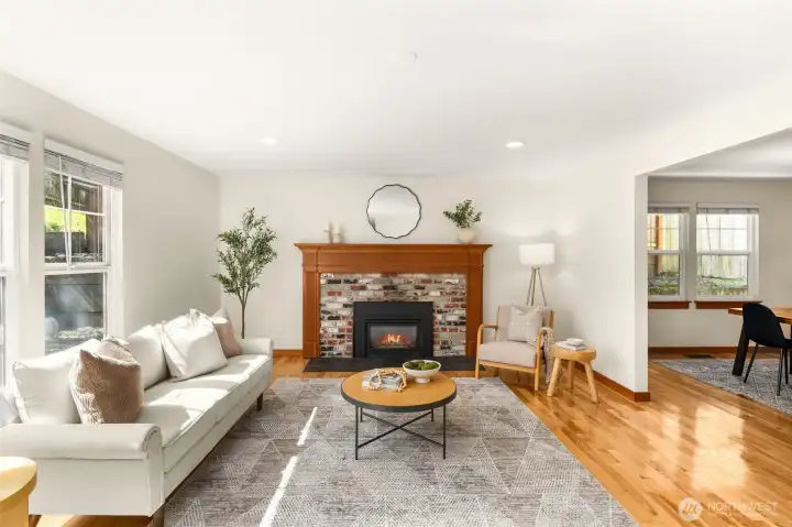 Light filled living room has an open flow to the dining area creates an ideal layout