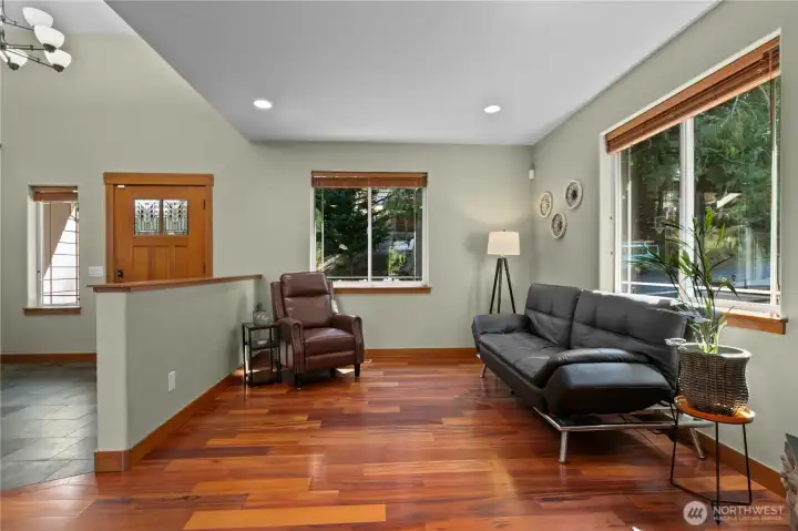 Main level living area with easy flow from kitchen and dining areas.