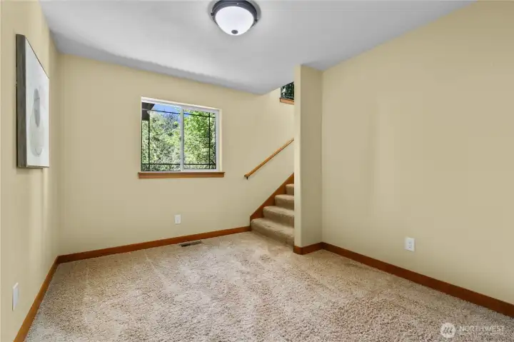 Comfortable secondary living space perfect for a study or reading nook.