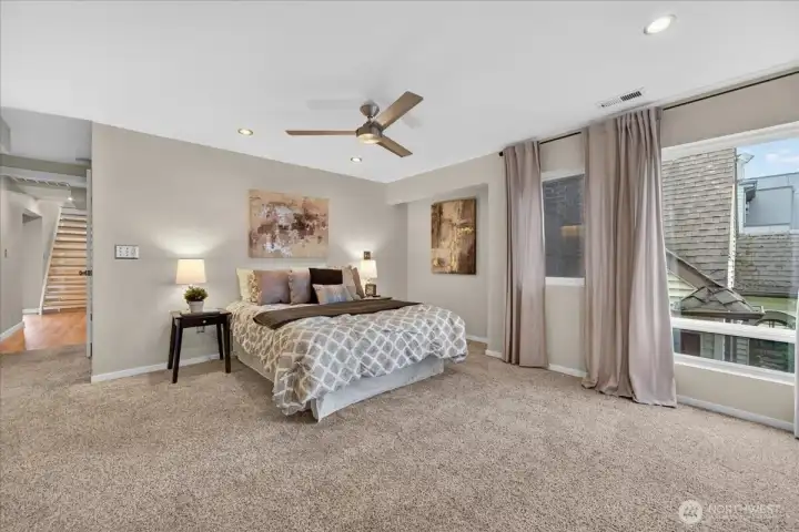 2nd Main en Suite bedroom with French doors leading to a deck