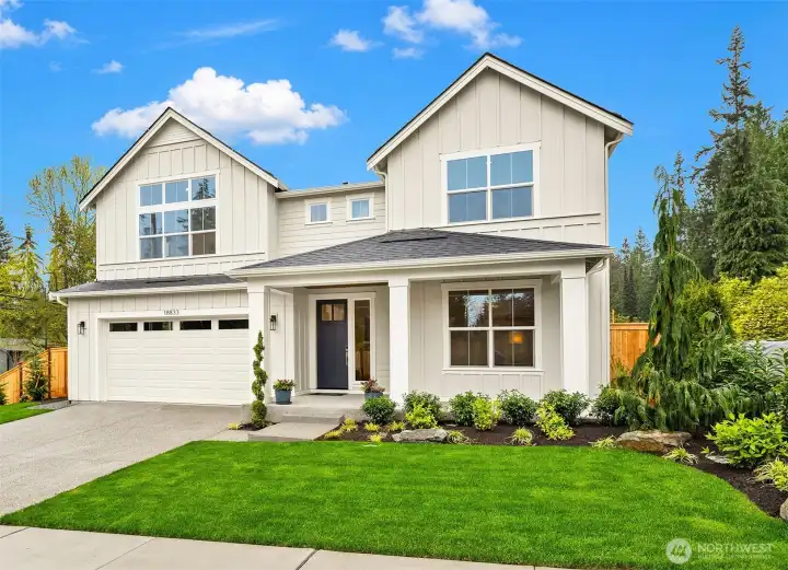 The Reserve, the Tahoma floor plan on lot 3, facing North. Beautiful landscaping with front and back yard sprinkler system.