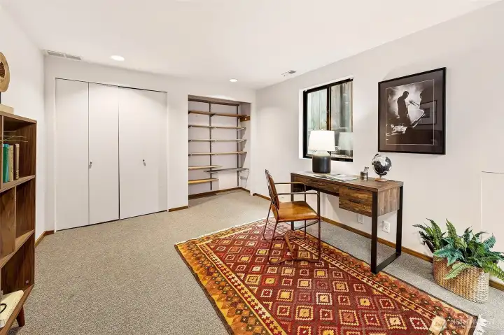 In addition to this spacious bedroom/office on the lower level one will find two large storage rooms, bathroom, laundry.
