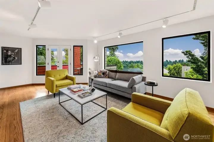 Take the elevator or the stairs up one level to the main level living room.