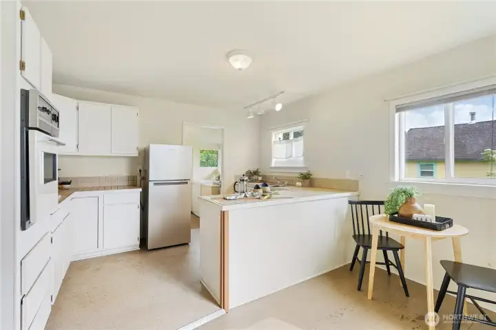 Sizable, open kitchen with room for dining