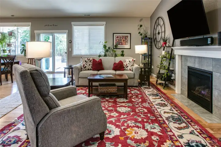 Living room and sliding doors to back yard and hot tub Living room and sliding doors to back yard and hot tub