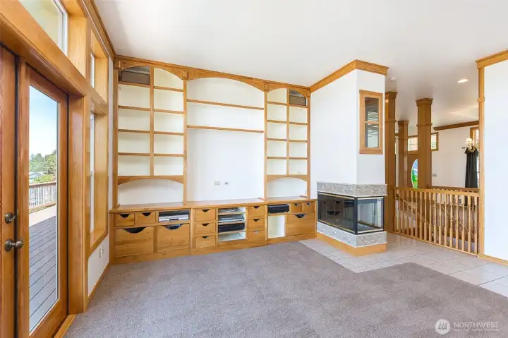 family room with custom shelving