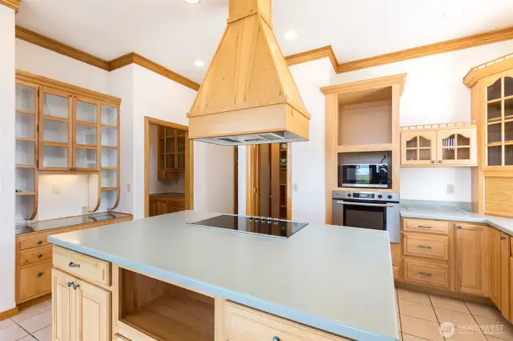 kitchen with wood accents and walloven