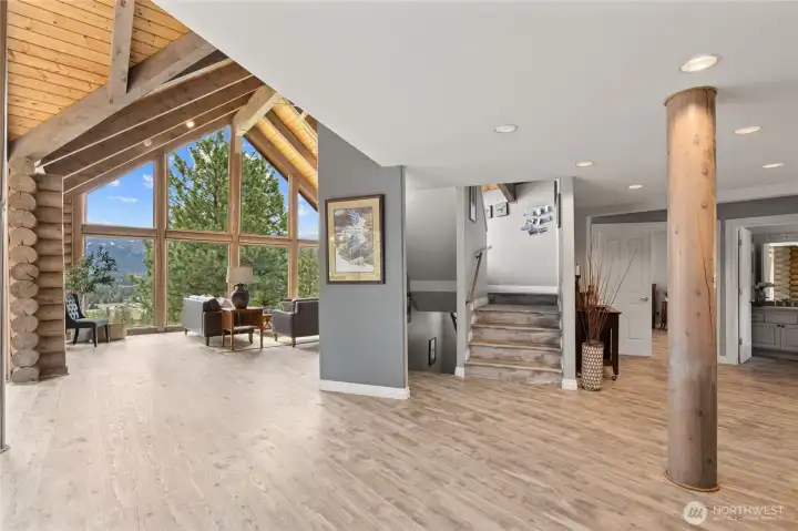 Freshly installed luxury vinyl plank  flooring throughout the home adds both beauty and practicality.