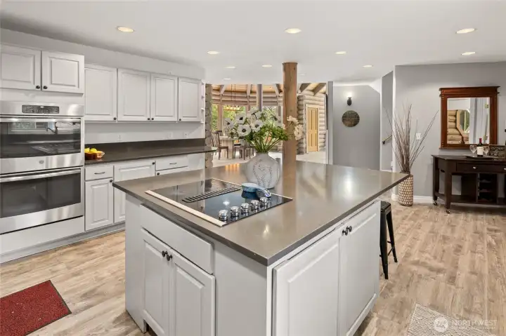 Newer quartz countertops and stainless appliances.