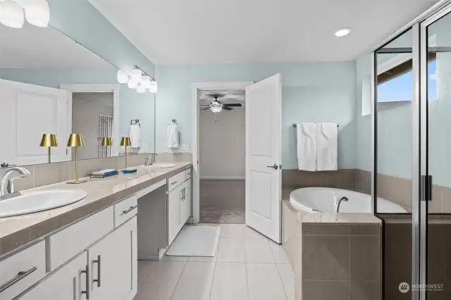 5-Piece Primary Bathroom with Beautiful Counters, Dual Sinks, Soaking Tub, and Extra Large Shower.