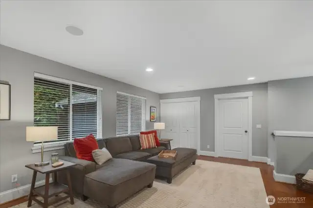 Loft/Rec room also features large windows.