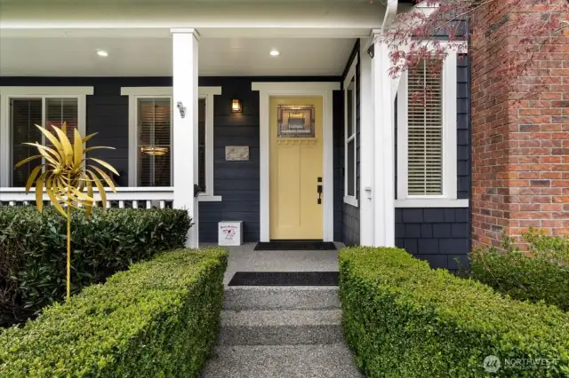 This beautiful home features a welcoming wraparound porch.