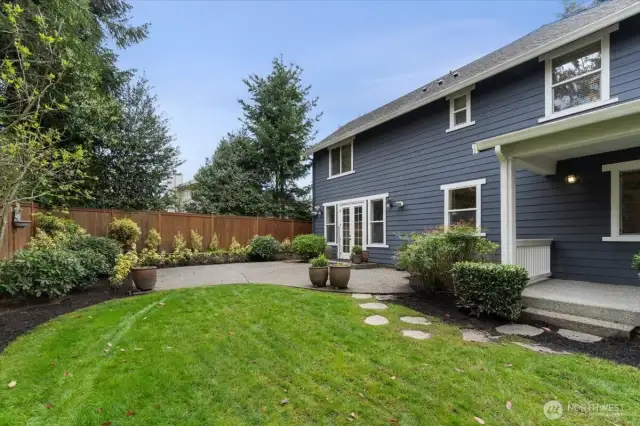 Side yard contains 3 fruit trees.