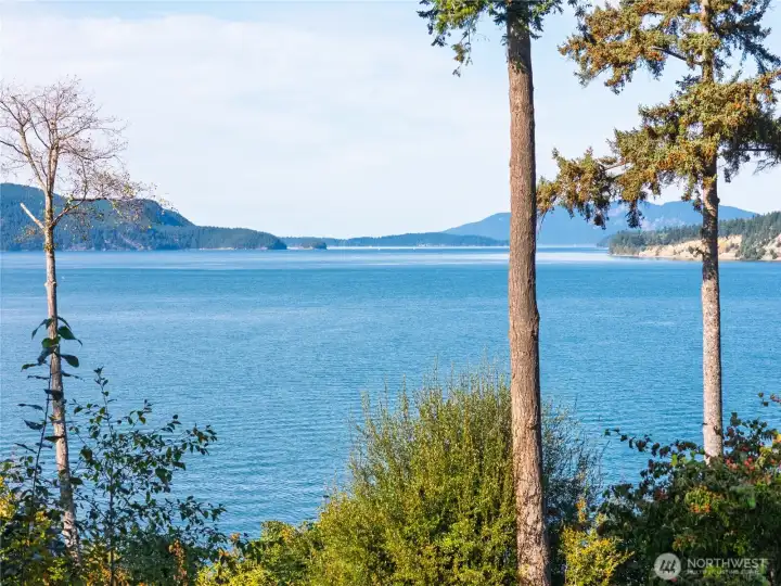 Water's edge on the Guemes Channel with views of the surrounding San Juan Islands.
