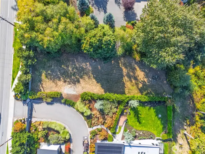 lot is adjacent to city property allowing for privacy and space to enjoy Guemes Channel waterfront living.