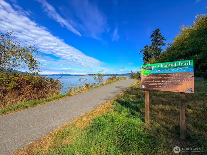 The start of The Guemes Channel Trail that runs along the front of the property.
