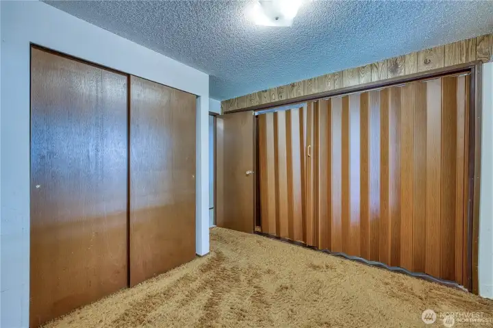 Guest bedrooms with divider.