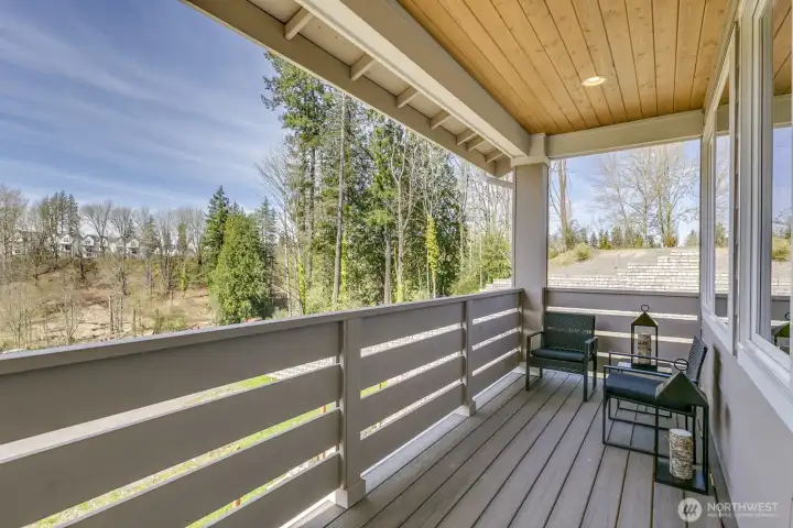 A covered deck off the dining room makes a relaxing retreat.