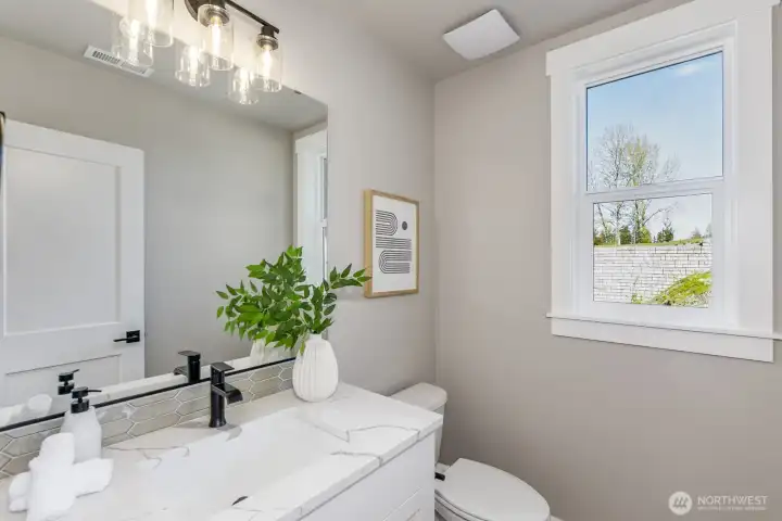 handy elegant powder bath on the main floor.