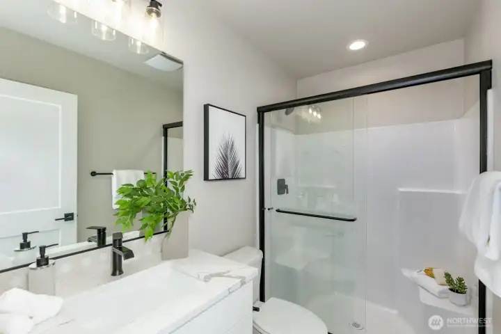 Three-quarter bath next to the guest bedroom on the lower level