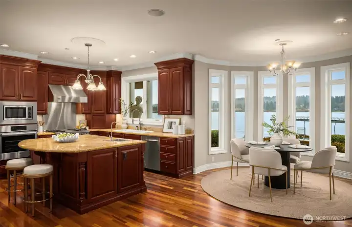 Breakfast area wrapped in windows overlooking Lake Washington.