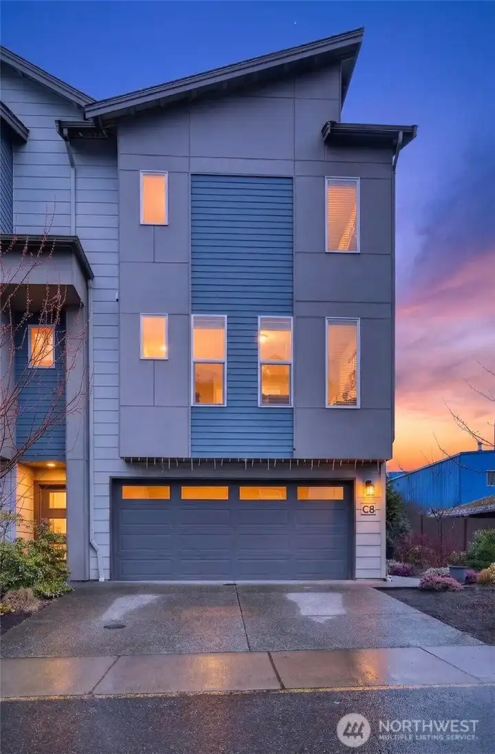 Stunning corner lot home with soaring windows, modern architecture, and exceptional natural light