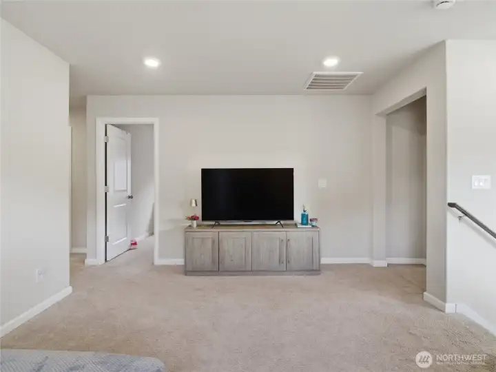 Primary bedroom to the Right, 3 other bedrooms to the Left giving the Primary its own privacy.