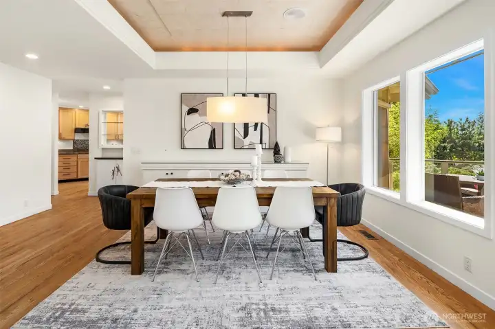 Spacious dining room offers large or intimate gatherings and opens to kitchen