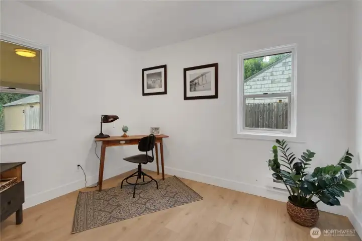 2nd bedroom is staged as an office, also has a closet.