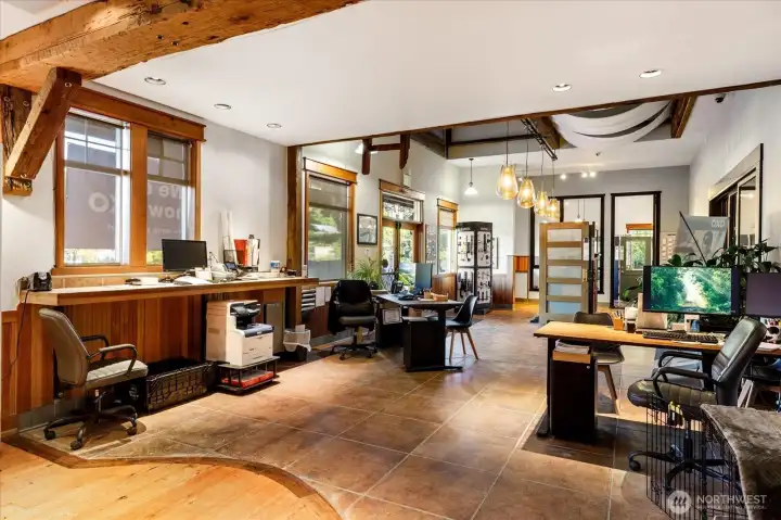 Looking towards the entry doors.  Notice the wood-wrapped (clear fir) windows and features throughout the building.