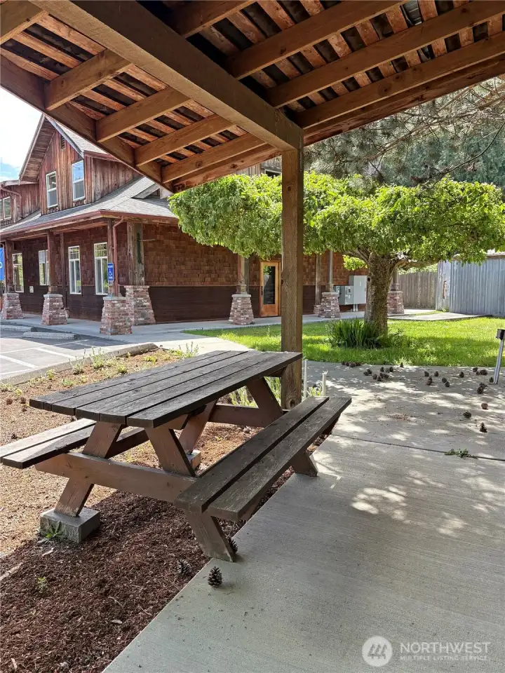 Employee outdoor break area, adjacent to 100+ year old apple tree from the original large family farm on this property.