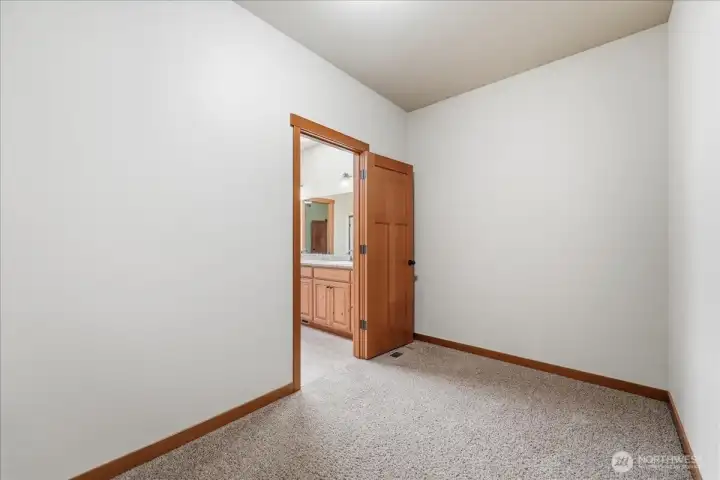 Primary Ensuite walk-in closet Primary Ensuite walk-in closet